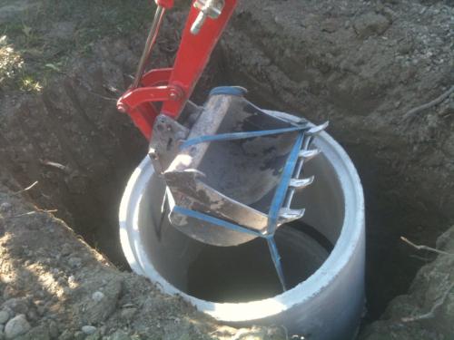Mise en place d'une buse pour construction d'un puits perdu